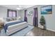 Cozy bedroom features a ceiling fan, an area rug, and stylish decor at 11973 80Th Ave, Seminole, FL 33772