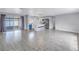 Open-concept living and dining area features tile floors and easy access to the kitchen at 11973 80Th Ave, Seminole, FL 33772
