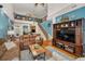 Spacious living room with open access to the kitchen and dining area; lots of natural light at 13207 San Blas Loop, Largo, FL 33774