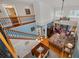 View from above of the living room and the staircase leading to the second story at 13207 San Blas Loop, Largo, FL 33774