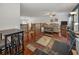 Loft featuring a study area, hardwood floors, and views of the open living space below at 13207 San Blas Loop, Largo, FL 33774