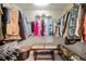 The walk-in closet is equipped with shelving and hanging racks for organized storage at 13207 San Blas Loop, Largo, FL 33774