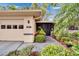 Charming home with an enclosed front porch, two car garage, and well-maintained landscaping at 1426 Ingram Dr # 1426, Sun City Center, FL 33573