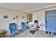 Relaxing covered front porch featuring comfortable seating and a charming, welcoming atmosphere at 1426 Ingram Dr # 1426, Sun City Center, FL 33573