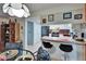 Kitchen featuring a breakfast bar, stainless steel refrigerator, and stylish decor in dining area at 1426 Ingram Dr # 1426, Sun City Center, FL 33573