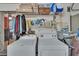 Efficient laundry room with washer, dryer, and storage shelves for household cleaning supplies at 1426 Ingram Dr # 1426, Sun City Center, FL 33573