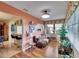 Cozy living room with hardwood floors, comfortable seating, and natural light through the windows at 1426 Ingram Dr # 1426, Sun City Center, FL 33573