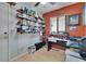 A spacious office featuring ample shelving, providing plenty of room for organization and storage at 1426 Ingram Dr # 1426, Sun City Center, FL 33573