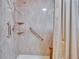 Accessible shower equipped with grab bars and adjustable shower head at 1426 Ingram Dr # 1426, Sun City Center, FL 33573