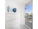 Close-up of a bedroom showing a modern dresser with a view to the outside at 15 Avalon St # 303, Clearwater Beach, FL 33767