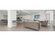 Spacious common room with a bar, dining area, and lounge featuring comfortable seating at 15 Avalon St # 303, Clearwater Beach, FL 33767
