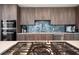 Close up on the gourmet gas stovetop at 15 Avalon St # 303, Clearwater Beach, FL 33767
