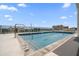 Rooftop pool with clear barrier offers city views, perfect for relaxation and leisure at 15 Avalon St # 303, Clearwater Beach, FL 33767