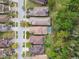 Aerial view of homes showing the roof lines and property boundaries in a residential neighborhood at 16011 Bella Woods Dr, Tampa, FL 33647