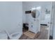 This bathroom features a vanity with storage, modern fixtures, and neutral tones at 1605 Crown St, Clearwater, FL 33755
