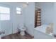 This is a bathroom featuring a shower/tub combo and modern fixtures at 1605 Crown St, Clearwater, FL 33755