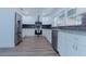 Modern kitchen with stainless steel appliances, granite countertops, and stylish backsplash at 1605 Crown St, Clearwater, FL 33755