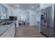 This is an airy kitchen with stainless steel appliances and access to an eat-in dining area at 1605 Crown St, Clearwater, FL 33755