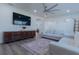 Spacious living room offering hardwood floors, neutral paint, and stylish furniture with lots of natural light at 1605 Crown St, Clearwater, FL 33755