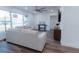 Bright living room featuring wood floors, a ceiling fan, and lots of natural light at 1605 Crown St, Clearwater, FL 33755