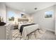 Bedroom with a beach painting and carpeted floors at 2011 Belleair Rd, Clearwater, FL 33764