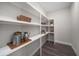 Well-organized pantry with custom shelving and storage solutions at 2011 Belleair Rd, Clearwater, FL 33764