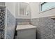 Stylish bathroom with decorative mosaic tile, a modern sink vanity, and natural light at 2517 3Rd N Ave, St Petersburg, FL 33713