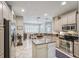 Well-equipped kitchen with granite countertops, and stainless steel appliances at 2926 Spring Hammock Dr, Plant City, FL 33566