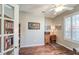 Cozy home office with natural light, built-in bookshelves, and a functional desk at 2926 Spring Hammock Dr, Plant City, FL 33566