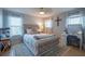 Bright bedroom with a cozy bed, vanity, and a serene ambiance with natural lighting at 309 Royal Bonnet Dr, Apollo Beach, FL 33572