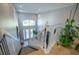 Grand foyer showcasing a staircase, high ceilings, and large windows, creating a welcoming entrance at 309 Royal Bonnet Dr, Apollo Beach, FL 33572
