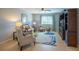 Inviting living room featuring stylish seating, a ceiling fan, and ample natural light at 309 Royal Bonnet Dr, Apollo Beach, FL 33572