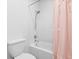 Bright bathroom featuring shower and toilet at 3115 W Paxton Ave, Tampa, FL 33611