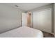 Bright bedroom featuring a closet, plush carpeting and view to the rest of the home at 3139 Marine Grass Dr, Wimauma, FL 33598