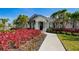 Beautiful clubhouse with lots of curb appeal and lush landscaping at 3139 Marine Grass Dr, Wimauma, FL 33598