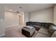 Carpeted loft area with comfortable seating and lots of space at 3139 Marine Grass Dr, Wimauma, FL 33598