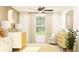 Neutral toned Bedroom room featuring a lit moon decoration, a rug, and a ceiling fan at 3704 Forest Path Dr, Plant City, FL 33565