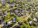 Aerial view highlighting the property's layout, pool, and large lot size at 37420 Meridian Ave, Dade City, FL 33525