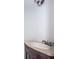 Powder room featuring an ornate vanity and a vessel sink at 409 S Arrawana Ave, Tampa, FL 33609