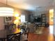A stylish living room with modern decor, wooden floors, and neutral tones for a warm ambiance at 409 S Arrawana Ave, Tampa, FL 33609
