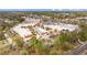 Aerial view of community shopping center and parking at 4160 Pinelake Ln # 201, Tampa, FL 33618