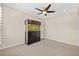 Simple bedroom with a ceiling fan and aquarium at 4160 Pinelake Ln # 201, Tampa, FL 33618