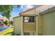 Exterior angle featuring building architecture with water views at 4160 Pinelake Ln # 201, Tampa, FL 33618