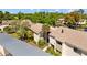 Exterior view of the home with lush tropical landscaping at 4160 Pinelake Ln # 201, Tampa, FL 33618