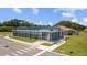 Exterior shot of Nature Center featuring modern architectural design and pedestrian walkway at 4160 Pinelake Ln # 201, Tampa, FL 33618