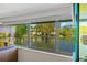 Close-up of aquarium with beautiful lake and backyard views at 4160 Pinelake Ln # 201, Tampa, FL 33618