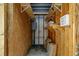 Interior view of storage unit with shelving, perfect for organization at 4160 Pinelake Ln # 201, Tampa, FL 33618