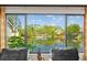 Scenic water view from the window, creating a tranquil ambiance and natural beauty at 4160 Pinelake Ln # 201, Tampa, FL 33618