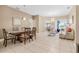Elegant dining room adjacent to the living area, perfect for Gathering meals and hosting guests at 4315 70Th E Ave, Ellenton, FL 34222