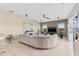 Spacious living room with a fireplace, modern furniture, and a relaxing atmosphere at 4315 70Th E Ave, Ellenton, FL 34222